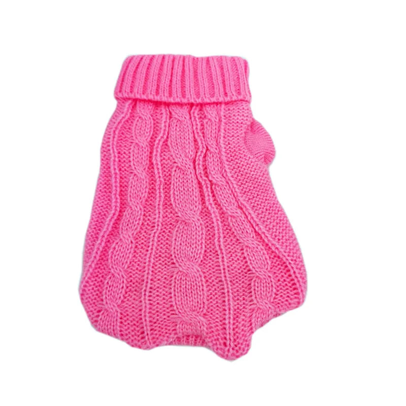 Pink cable knit dog sweater with a ribbed turtleneck