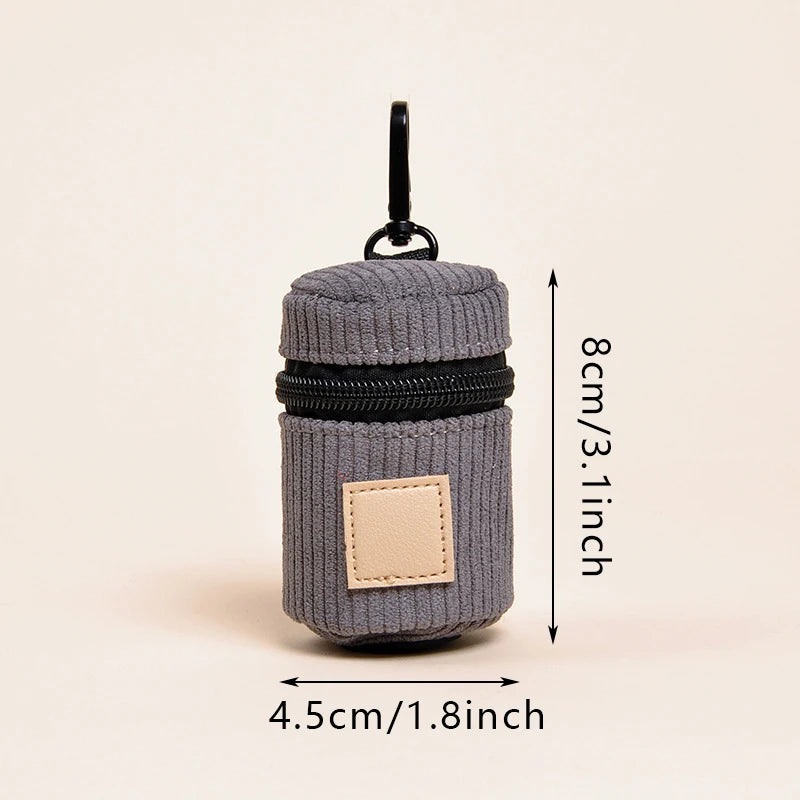 Gray corduroy dog poop bag holder with height and width measurements
