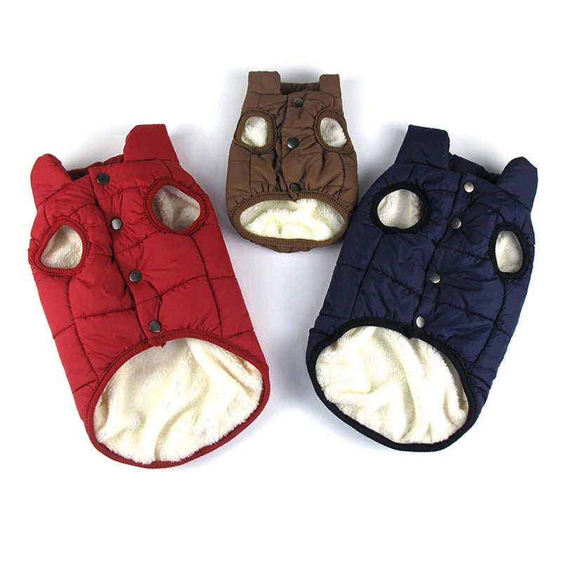 Red, brown, and navy dog puffer jackets showing snap fronts and fleece linings