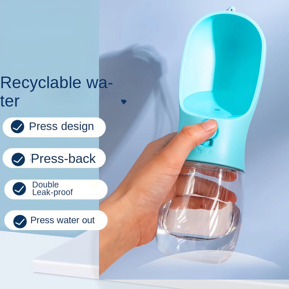 Finger pressing the water release button on a turquoise pet drinking bottle