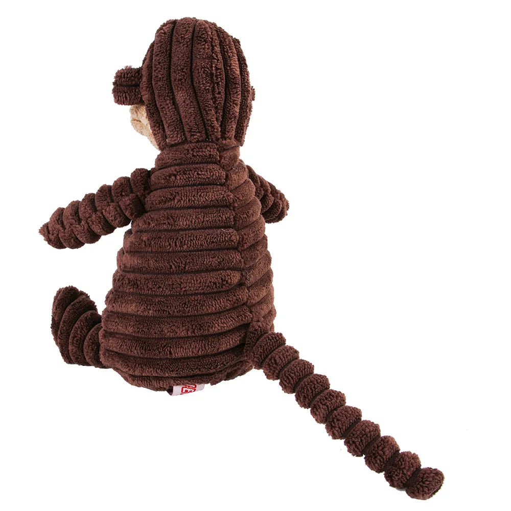 Rear view of a brown corduroy monkey dog toy with a long tail